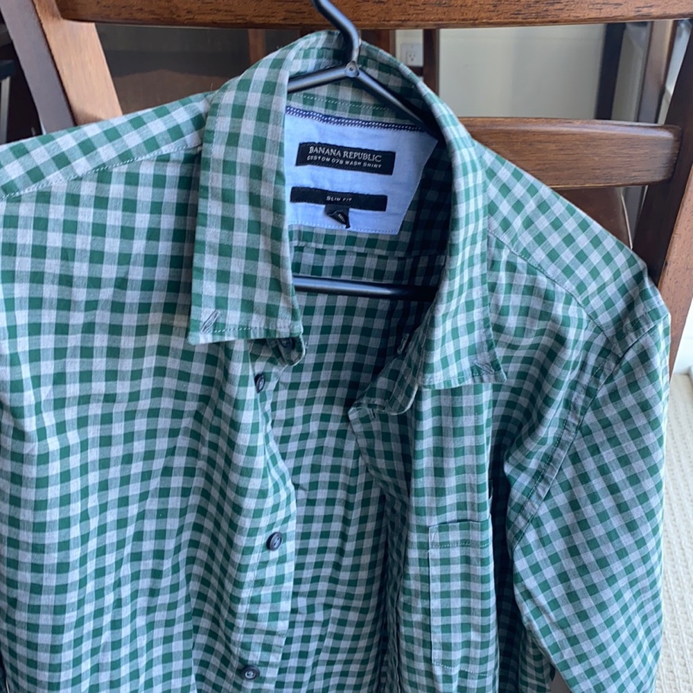 Green with Grey button up shirt.